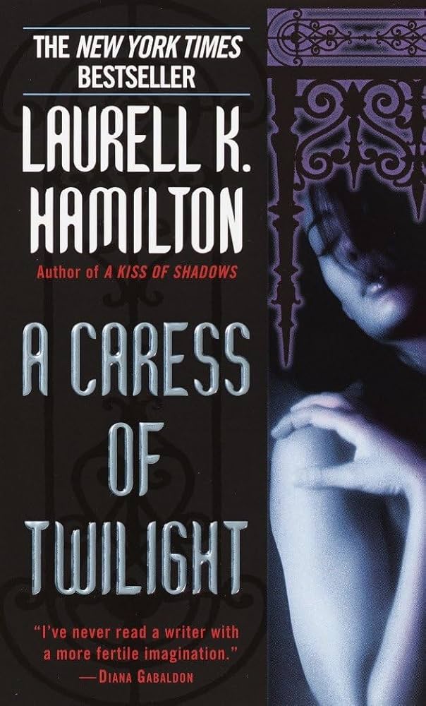 A Caress of Twilight (Meredith Gentry, Book 2) by Laurell K. Hamilton