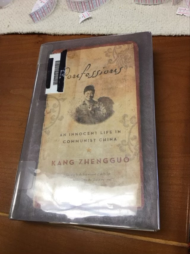 Confessions: An Innnocent Life in Communist China by Zhengguo Kang. * Ex Library Book
