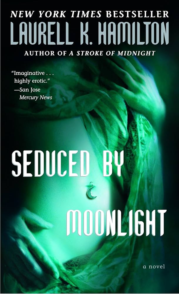 Seduced by Moonlight (Meredith Gentry, Book 3) by Laurell K. Hamilton