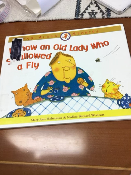 I Know an Old Lady Who Swallowed a Fly (Sing-Along Stories) by Mary Ann Hoberman * Ex-Library Book