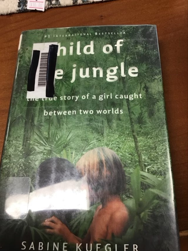 Child of the Jungle: The True Story of a Girl Caught Between Two Worlds by Sabine Kuegler  * Ex Library Book