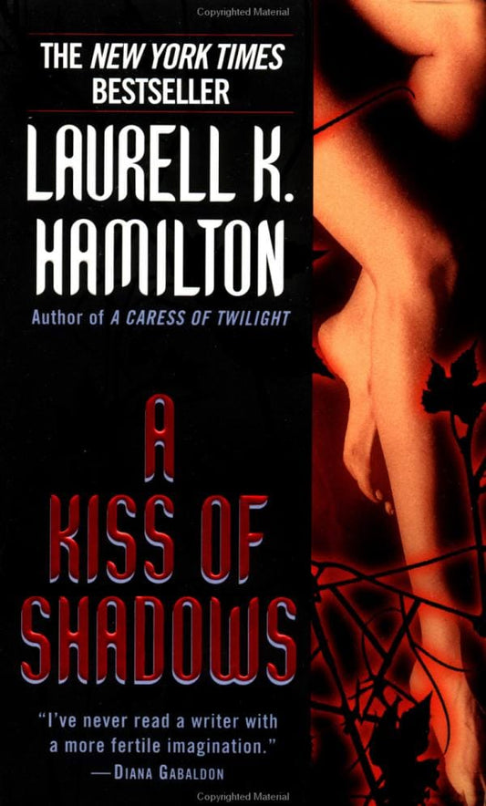 A Kiss of Shadows (Meredith Gentry, Book 1) by Laurell K. Hamilton